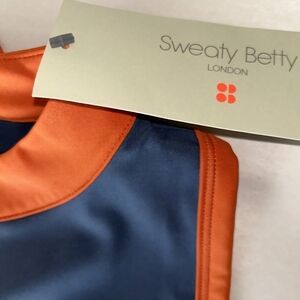 NWT  Sweaty Betty endless blue orange Power ColorblockRacerback Crop Tank L